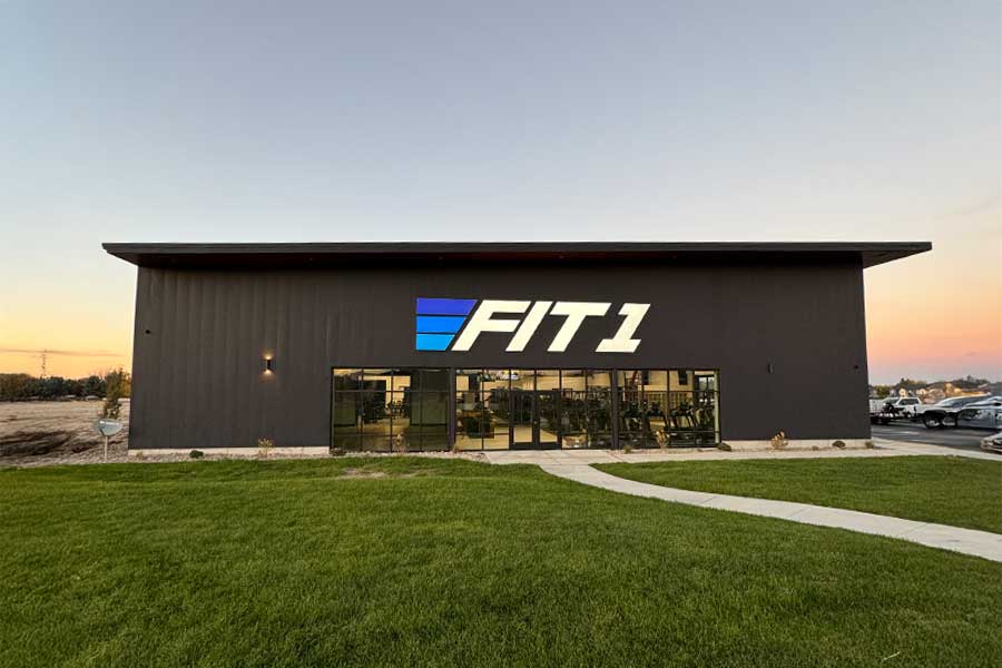 interior large building retail space, poured concrete floors, wood and steel roof interior beams