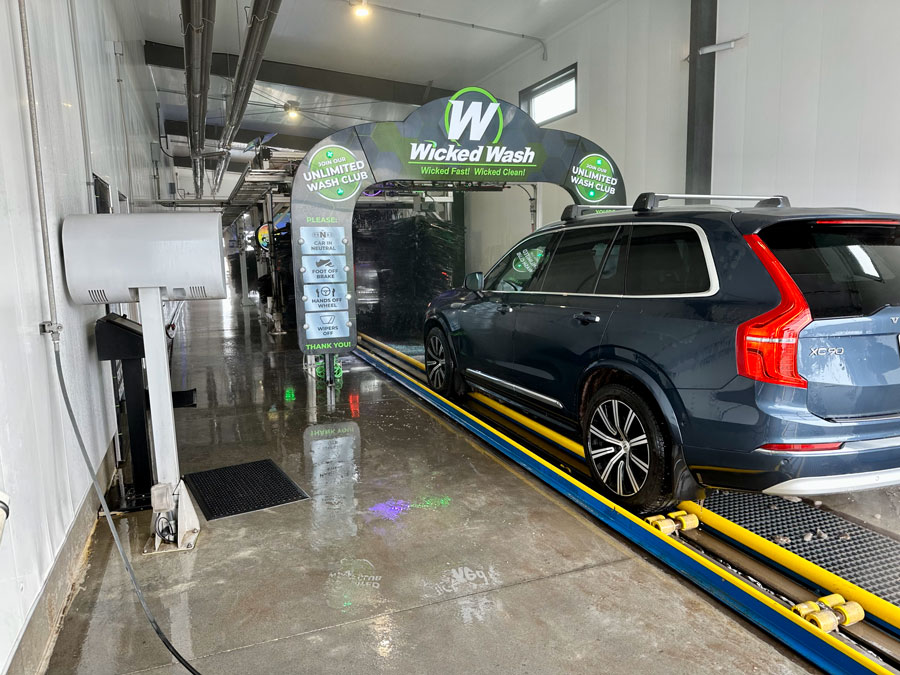 interior of car wash drive lane with vehicle entering